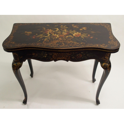 825 - An ebonised serpentine fold-over card table