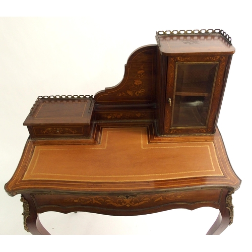 828 - A French rosewood and inlaid  gilt metal mounted writing desk