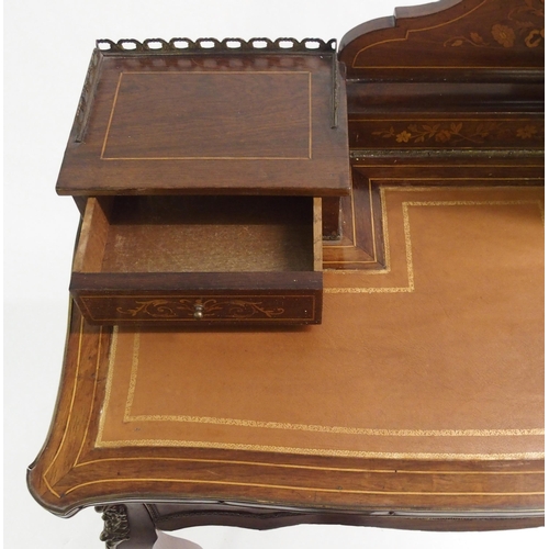 828 - A French rosewood and inlaid  gilt metal mounted writing desk