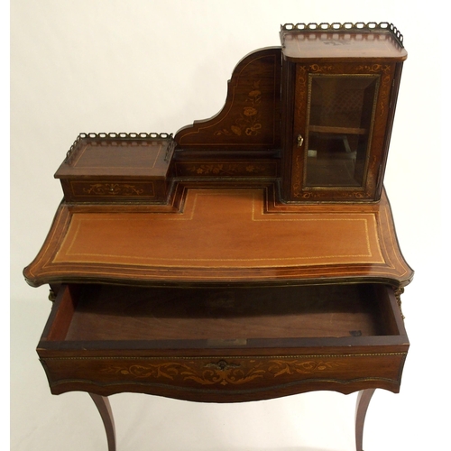 828 - A French rosewood and inlaid  gilt metal mounted writing desk