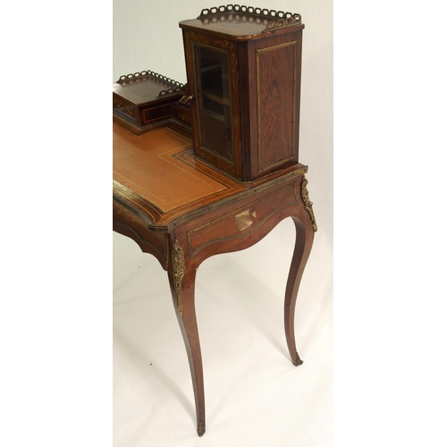 828 - A French rosewood and inlaid  gilt metal mounted writing desk