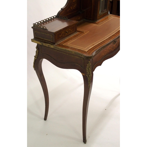 828 - A French rosewood and inlaid  gilt metal mounted writing desk