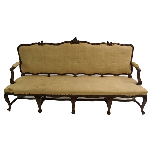 830 - A Spanish walnut four seat settee