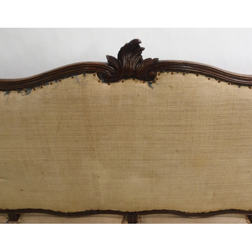 830 - A Spanish walnut four seat settee