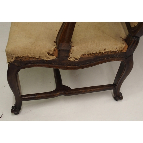 830 - A Spanish walnut four seat settee