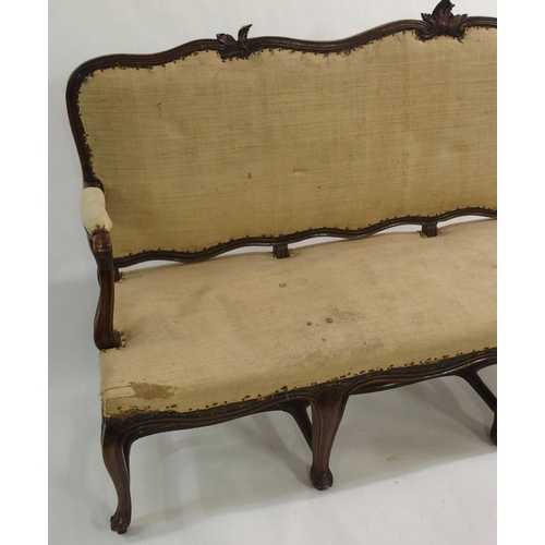 830 - A Spanish walnut four seat settee