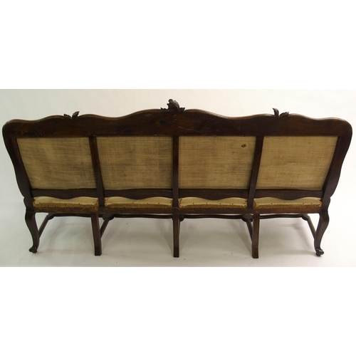 830 - A Spanish walnut four seat settee