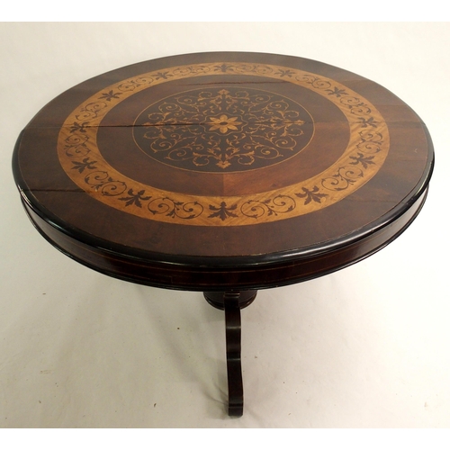 832 - A Continental mahogany and inlaid circular table