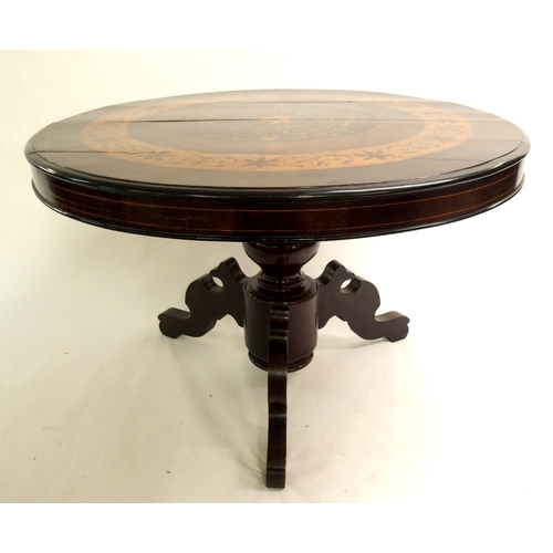 832 - A Continental mahogany and inlaid circular table