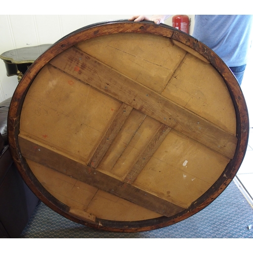 832 - A Continental mahogany and inlaid circular table