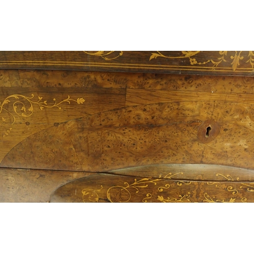 840 - A Continental rosewood and burr walnut serpentine chest