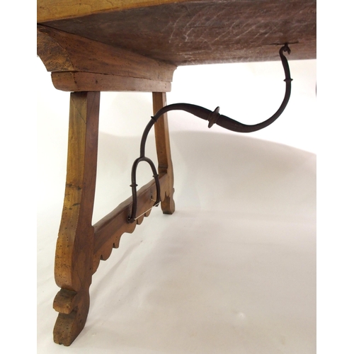 842 - A Spanish walnut trestle table