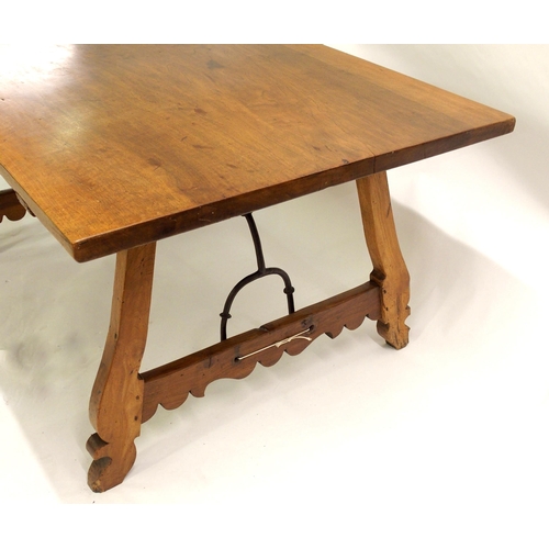 842 - A Spanish walnut trestle table