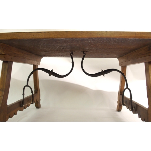 842 - A Spanish walnut trestle table