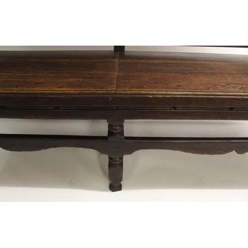 844 - A 19th Century oak four seat hall bench