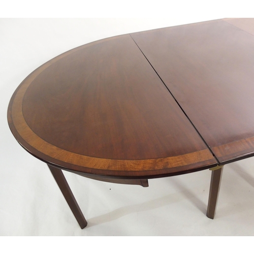 850 - A Georgian style mahogany  crossbanded and ebony lined twin D-end dining table