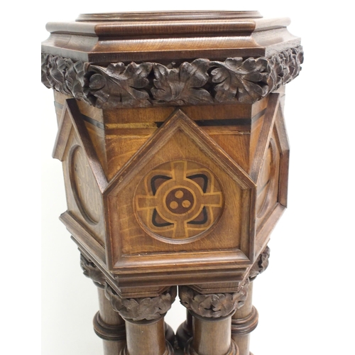 851 - A Puginesque oak hexagonal baptismal font