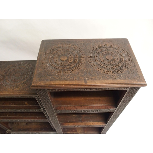 853 - A Victorian oak and pine carved pedestal bookcase