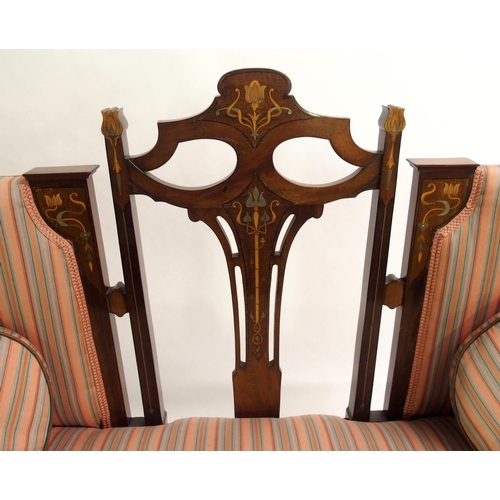 856 - An Arts and Crafts mahogany and inlaid settee