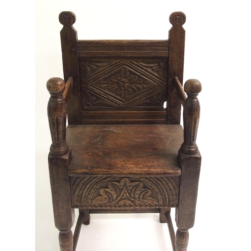 857 - An 18th Century style oak high chair