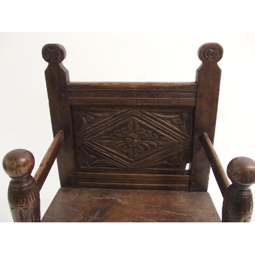 857 - An 18th Century style oak high chair