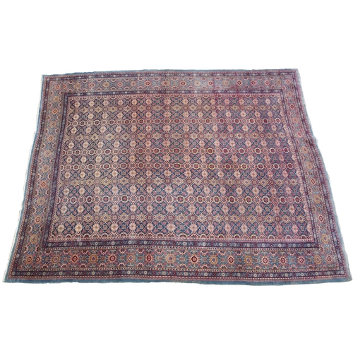 893 - A blue ground Persian rug