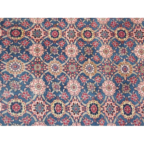 893 - A blue ground Persian rug