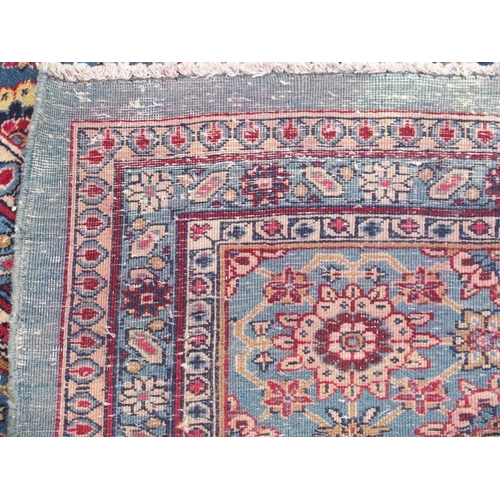 893 - A blue ground Persian rug