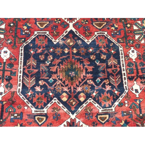 897 - A red ground Bakhtier rug