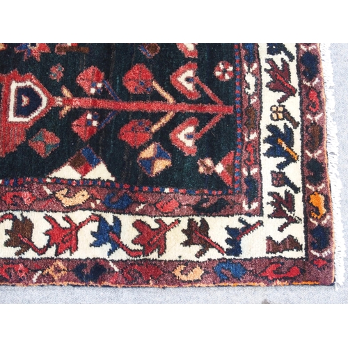 897 - A red ground Bakhtier rug