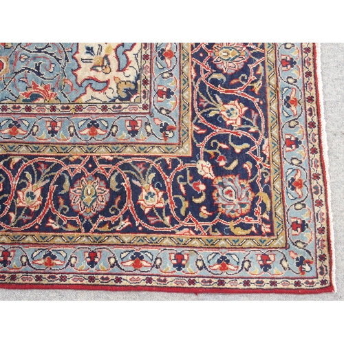 898 - A red ground Sarough rug