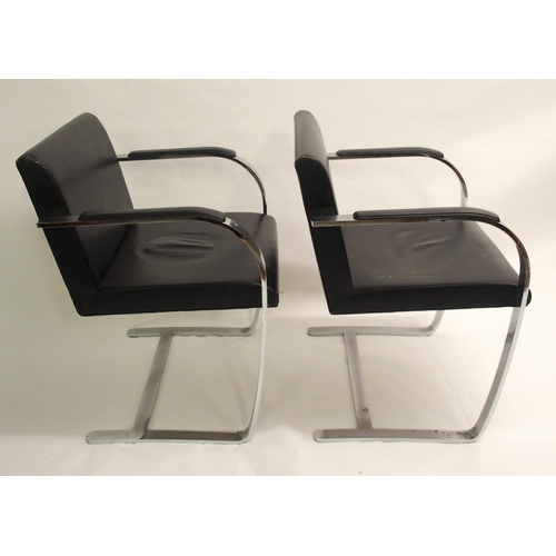 902 - A set of six of chrome and black leather chairs