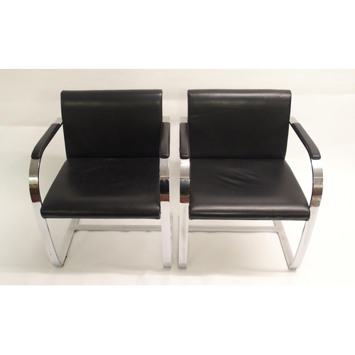 902 - A set of six of chrome and black leather chairs