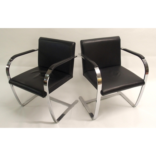 902 - A set of six of chrome and black leather chairs