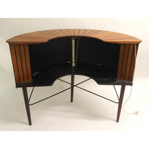 904 - A mid-20th Century teak and black steel drinks cabinet/bar