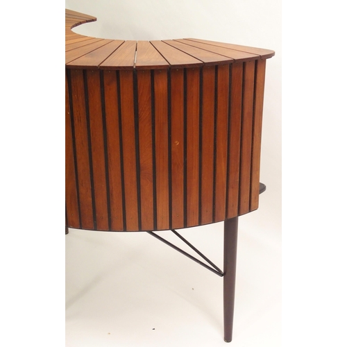 904 - A mid-20th Century teak and black steel drinks cabinet/bar