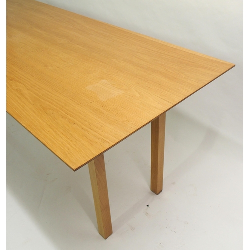 906 - A late 20th Century ash dining table by Mackintosh Cabinet Makers  Glasgow