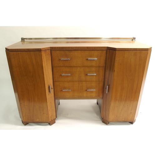 907 - An Art Deco walnut dining suite