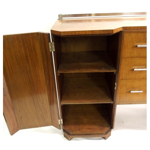 907 - An Art Deco walnut dining suite