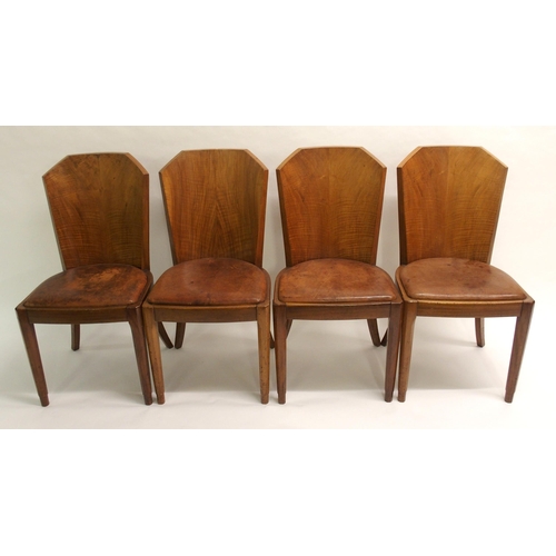 907 - An Art Deco walnut dining suite