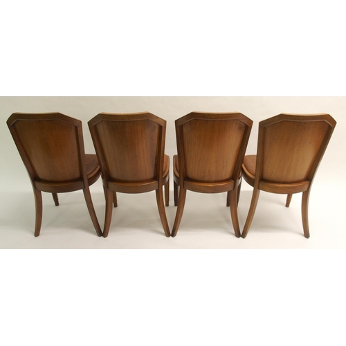 907 - An Art Deco walnut dining suite