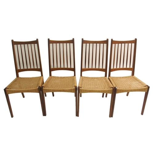 910 - Four Danish style teak spindleback dining chairs