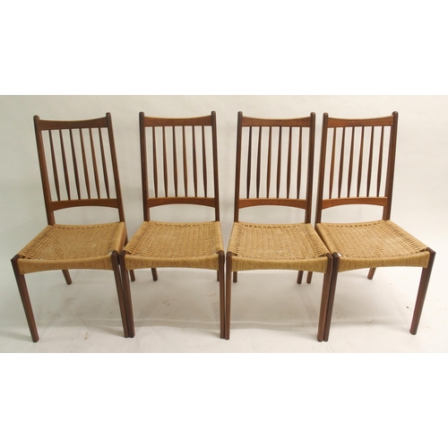 910 - Four Danish style teak spindleback dining chairs