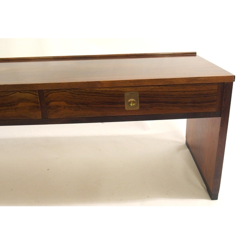 912 - *WITHDRAWN* A rosewood low table by Bruksbo of Norway