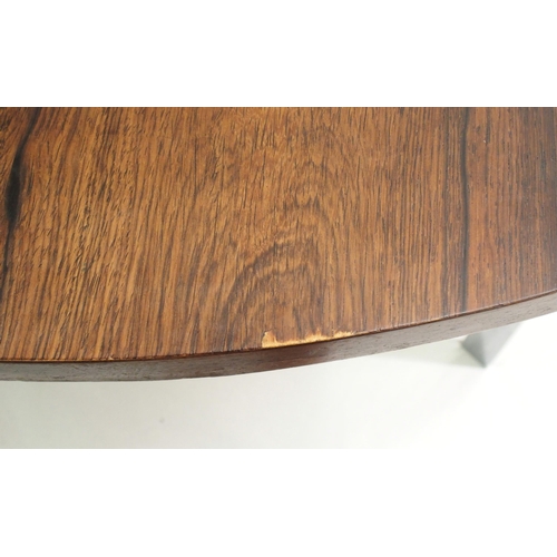 913 - A Merrow Associates circular rosewood table