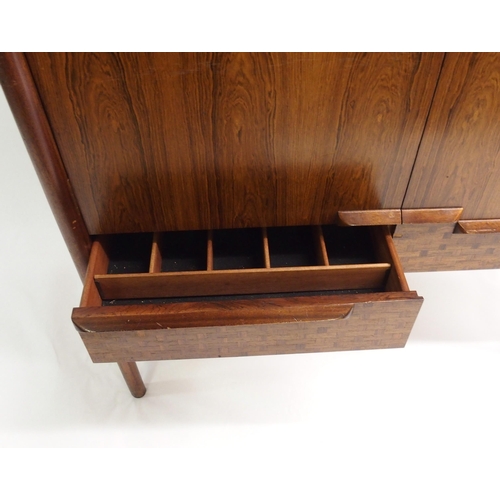 914 - A 1960's rosewood sideboard/drinks cabinet