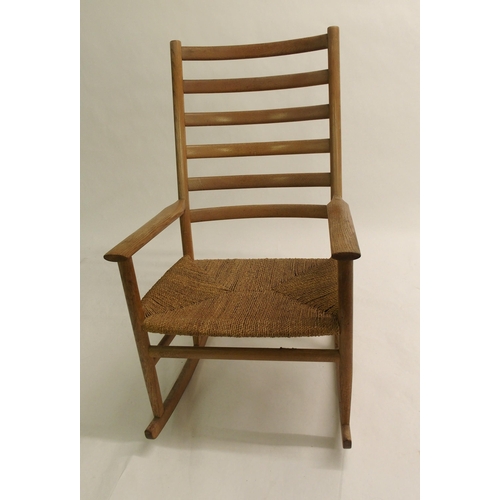 917 - A Danish ash ladder-back rocking chair