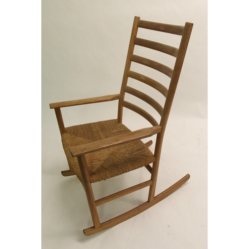 917 - A Danish ash ladder-back rocking chair