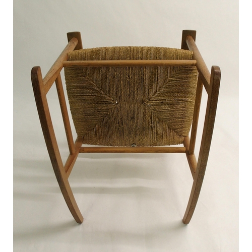 917 - A Danish ash ladder-back rocking chair