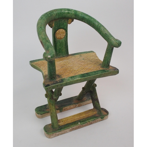 100 - A Tang style horse-shoe back armchair